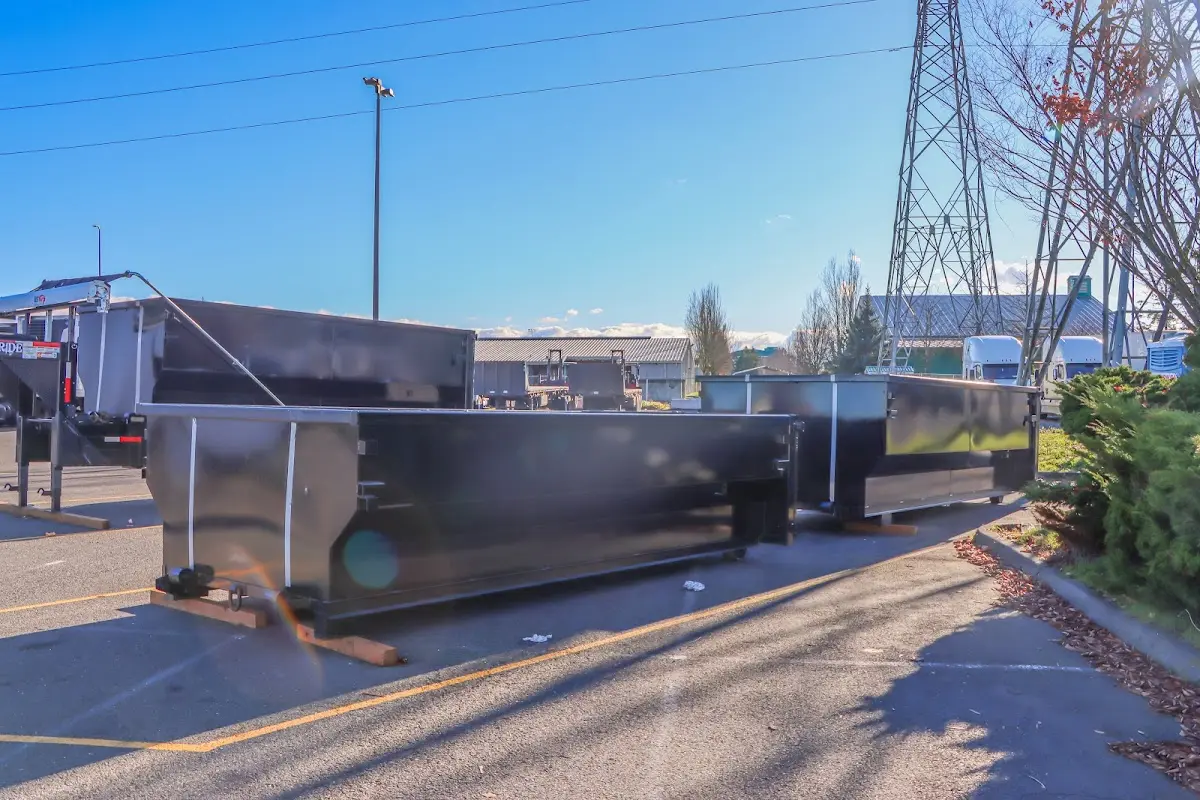 Roll-off dumpster ready for waste disposal at job site for Demolition Dumpster Rental in Rio Rancho